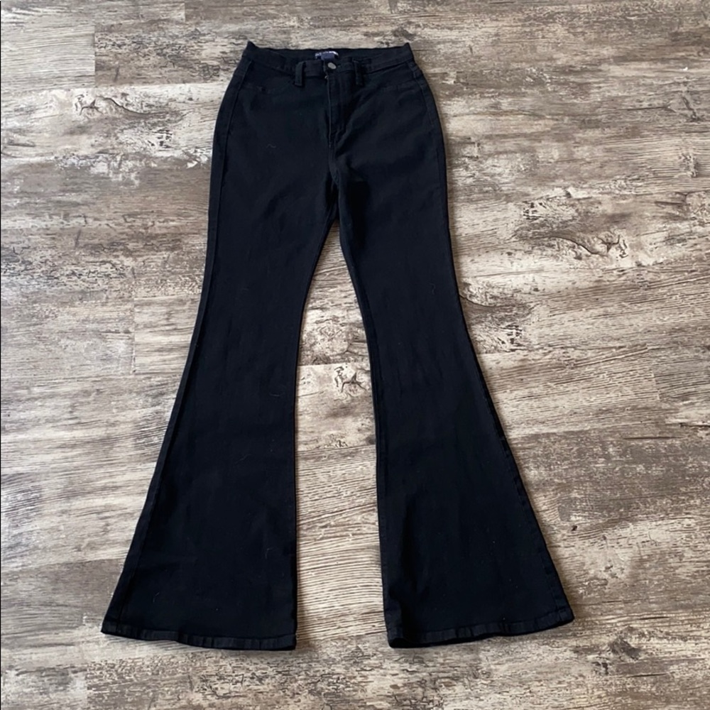 High waisted stretch jeans with flare bottom.